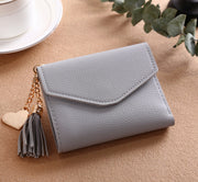 Female purse tassel