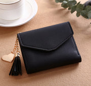 Female purse tassel