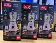 Three ONIDA blender and grinder packages on a table.